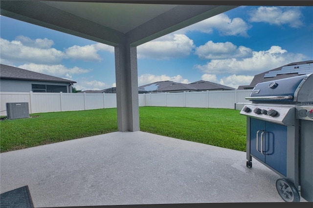 view of patio / terrace with grilling area and cooling unit