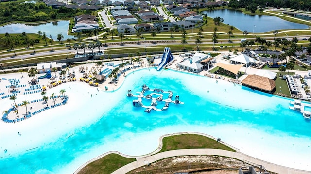 bird's eye view with a water view