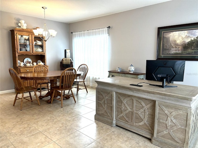 tiled dining room with a notable chandelier