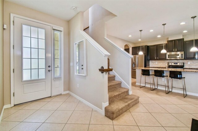 view of tiled entrance foyer