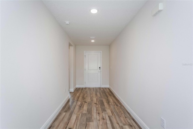 hallway featuring light wood-type flooring