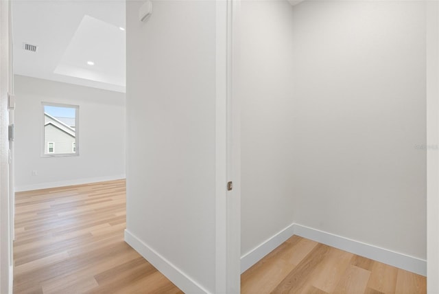 hall with light hardwood / wood-style flooring