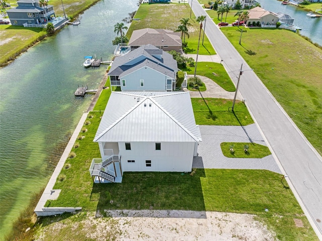 drone / aerial view featuring a water view