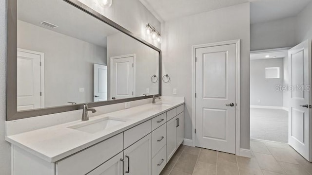 bathroom featuring vanity and tile patterned floors