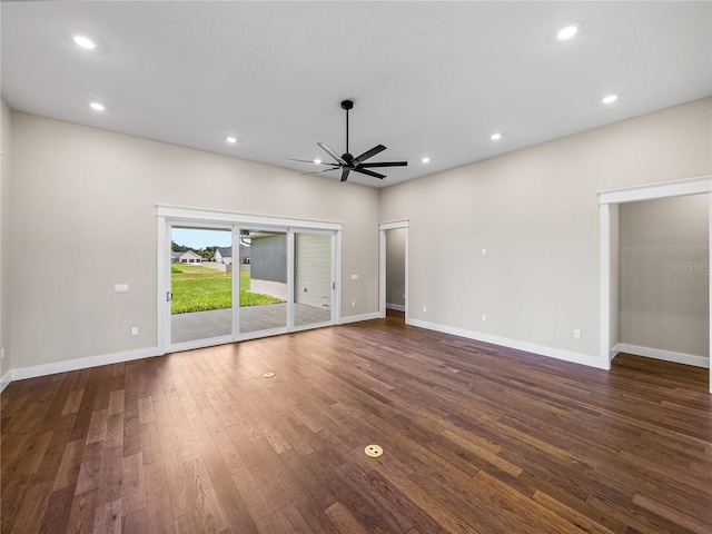 unfurnished living room featuring ceiling fan and hardwood / wood-style floors