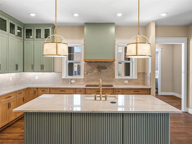 kitchen with plenty of natural light, dark wood-type flooring, and backsplash