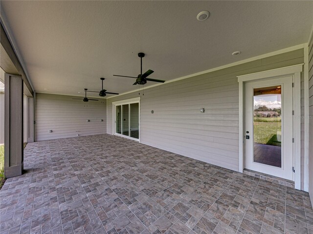 view of patio with ceiling fan