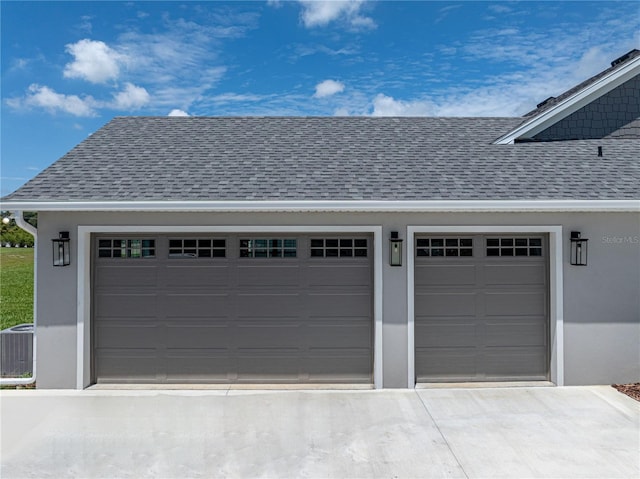 garage featuring central AC unit