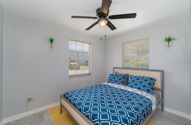 21 Cabana Ave, North Fort Myers, FL 33903 - bedroom featuring baseboards and a ceiling fan