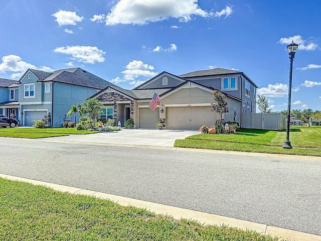 view of front facade with a garage and a front yard