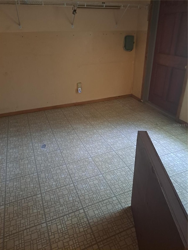 spare room with light tile patterned flooring