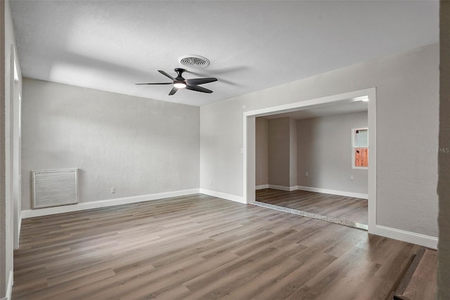 unfurnished room featuring wood-type flooring and ceiling fan