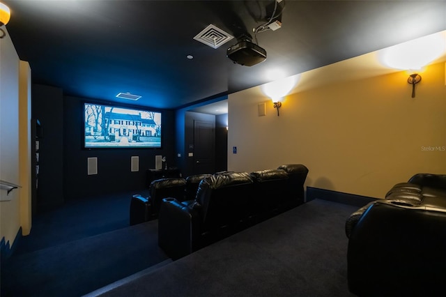 carpeted home theater room with visible vents