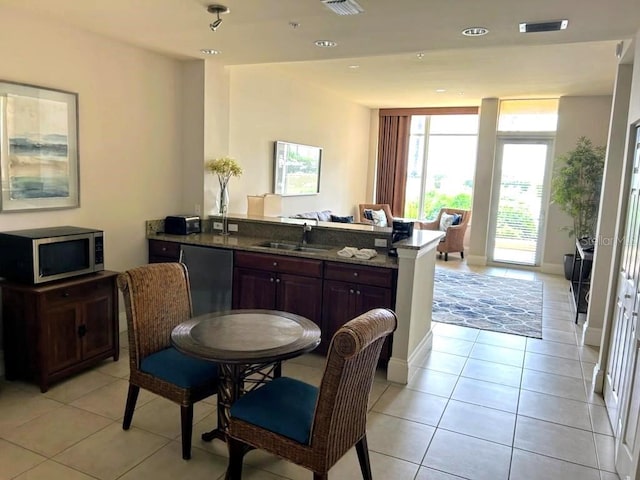 dining area with recessed lighting, visible vents, and light tile patterned floors