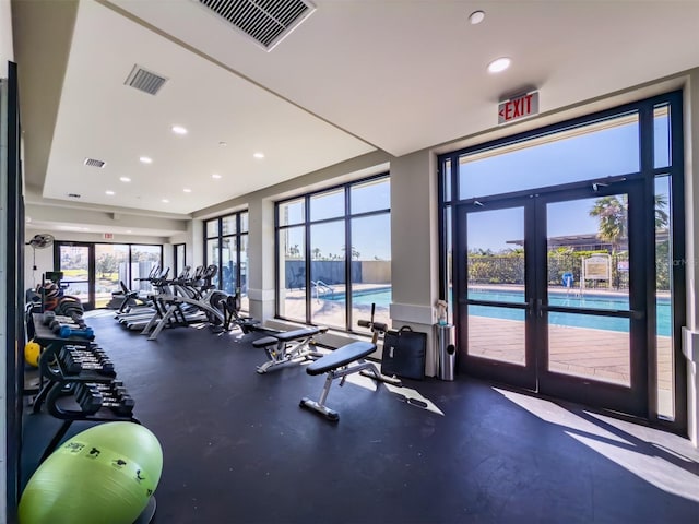 gym featuring french doors, visible vents, and recessed lighting