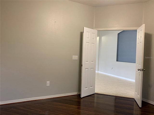 spare room featuring hardwood / wood-style flooring