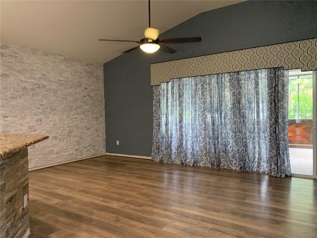 unfurnished living room with lofted ceiling, ceiling fan, and hardwood / wood-style flooring