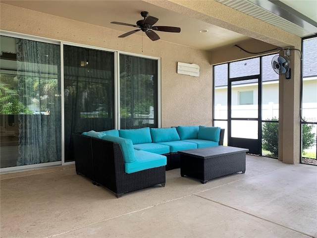 view of patio featuring ceiling fan and outdoor lounge area