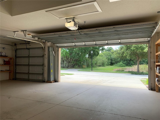 garage featuring a garage door opener