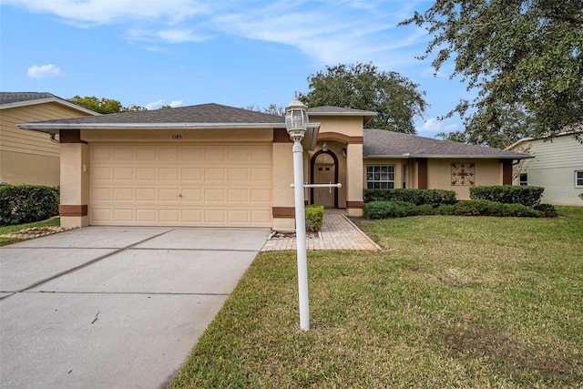 single story home featuring a front yard and a garage