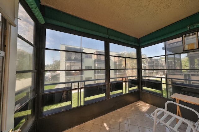 unfurnished sunroom with a wealth of natural light