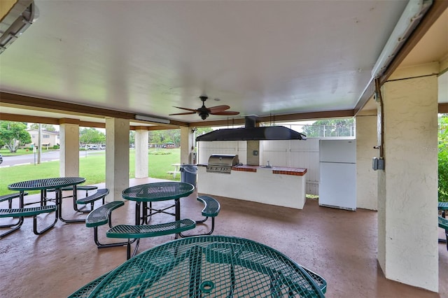 view of patio / terrace with area for grilling and ceiling fan