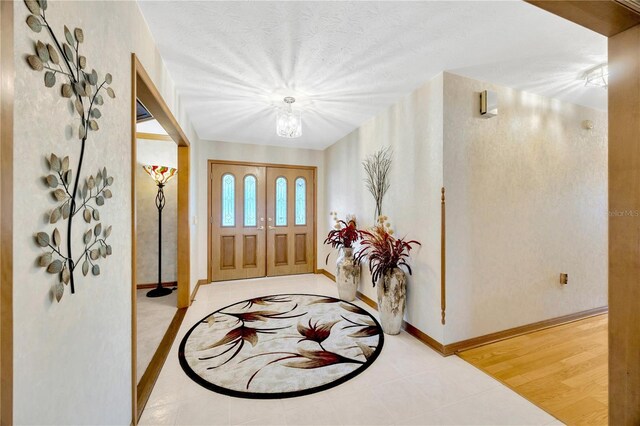 entrance foyer featuring light tile patterned floors