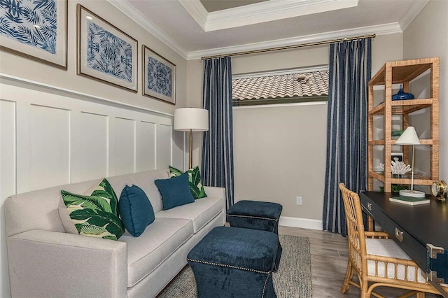 living area with dark wood-type flooring and crown molding