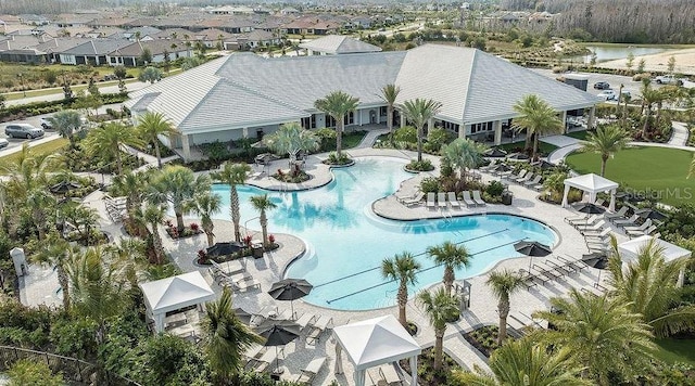 view of swimming pool featuring a patio area