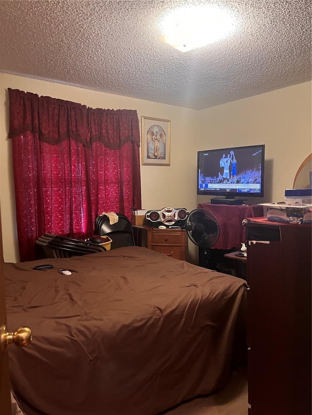 bedroom with a textured ceiling