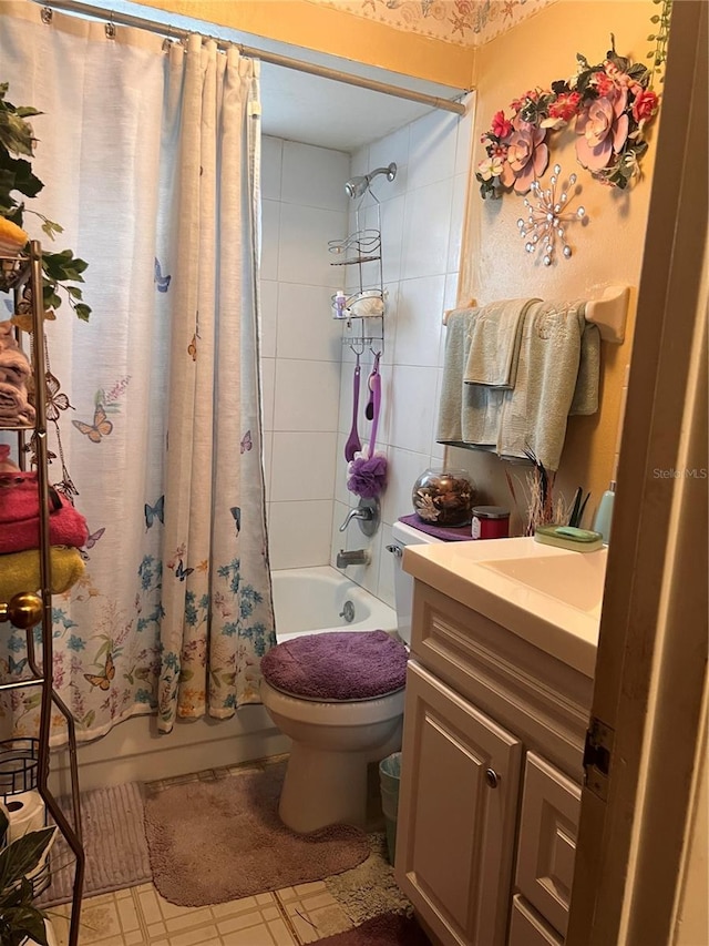 bathroom with shower / tub combo, vanity, and toilet