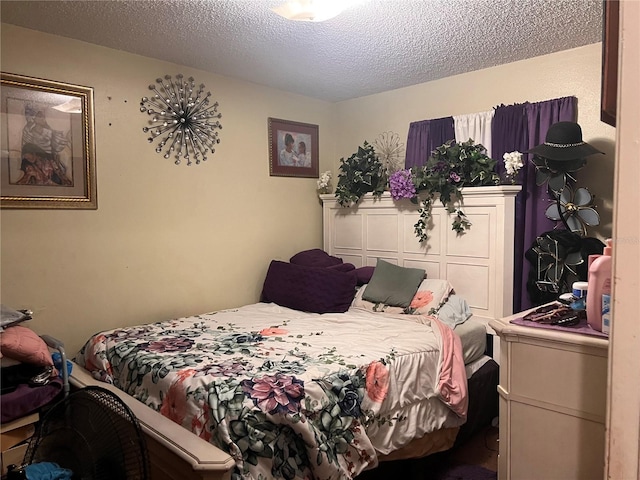 bedroom featuring a textured ceiling