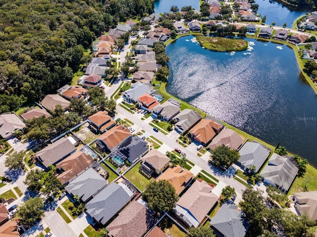 bird's eye view with a water view