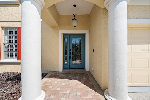 property entrance featuring a garage