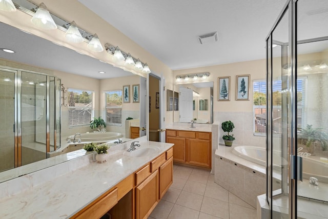 bathroom with vanity, separate shower and tub, and tile patterned floors