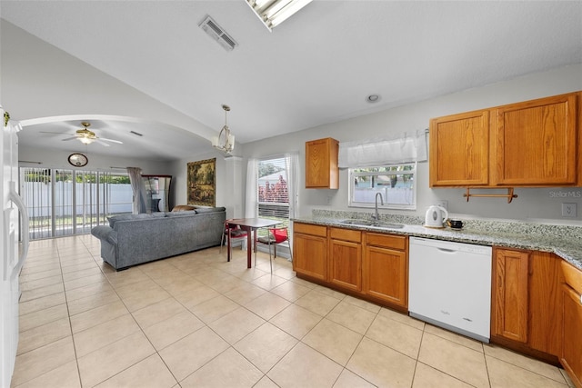 kitchen with ceiling fan, dishwasher, plenty of natural light, and sink