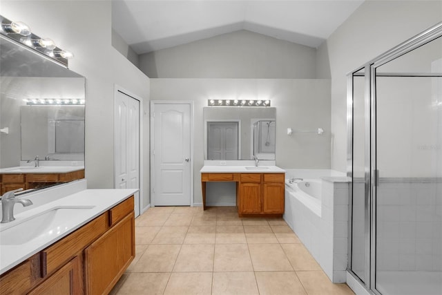 bathroom featuring lofted ceiling, vanity, plus walk in shower, and tile patterned floors