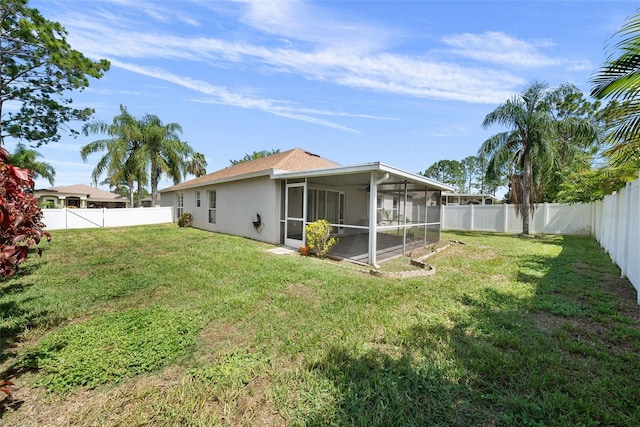 view of yard featuring a sunroom