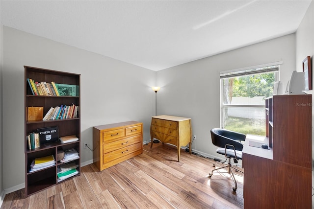 home office featuring hardwood / wood-style flooring