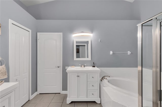 bathroom featuring vanity, shower with separate bathtub, and tile patterned flooring