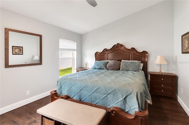 bedroom with ceiling fan and dark hardwood / wood-style flooring