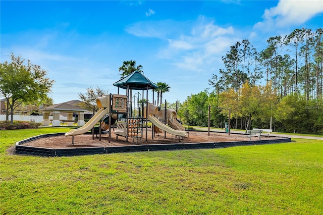 view of jungle gym featuring a lawn