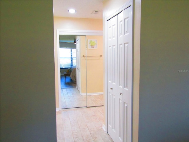 hall featuring light hardwood / wood-style floors