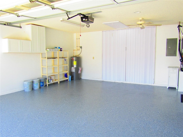 garage featuring a garage door opener, electric panel, electric water heater, and ceiling fan