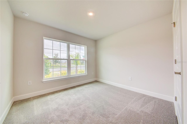 spare room with carpet flooring