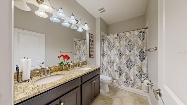 full bathroom featuring shower / tub combo, tile patterned flooring, vanity, and toilet