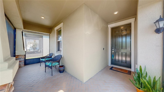 entrance to property featuring a porch