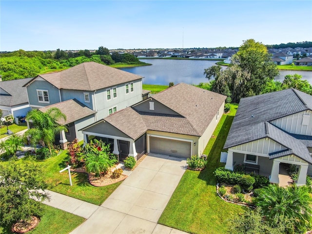 drone / aerial view featuring a water view