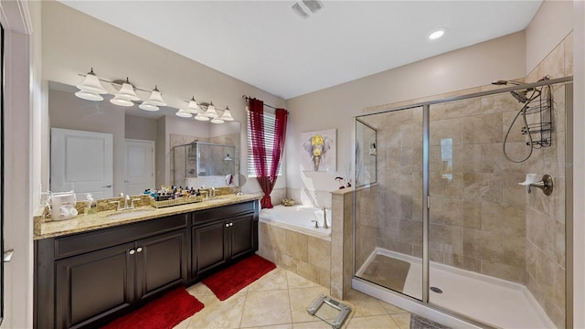 bathroom with tile patterned flooring, vanity, and plus walk in shower