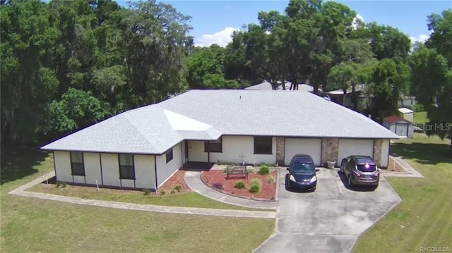 ranch-style home with a front yard